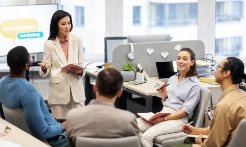 Call center agent using laptop while wearing a headset.