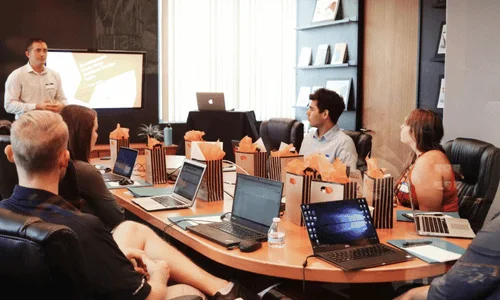 Team learning about business development and project updates.