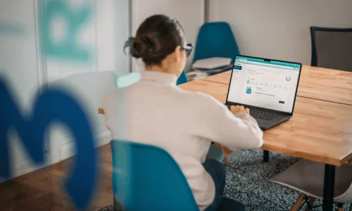 Close-up of user designing a marketing page on screen.